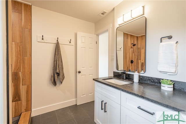 bathroom featuring vanity and tile patterned flooring