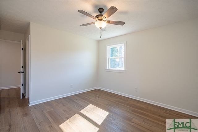 unfurnished room featuring hardwood / wood-style floors, a textured ceiling, and ceiling fan