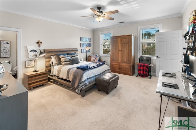 2203 River Oaks Dr, Richmond Hill, GA 31324 - bedroom featuring light colored carpet, visible vents, crown molding, and a ceiling fan