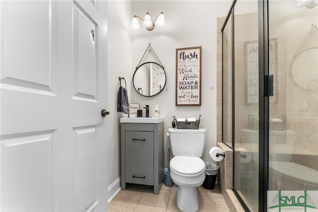 2203 River Oaks Dr, Richmond Hill, GA 31324 - bathroom with tile patterned floors, toilet, vanity, and a shower stall