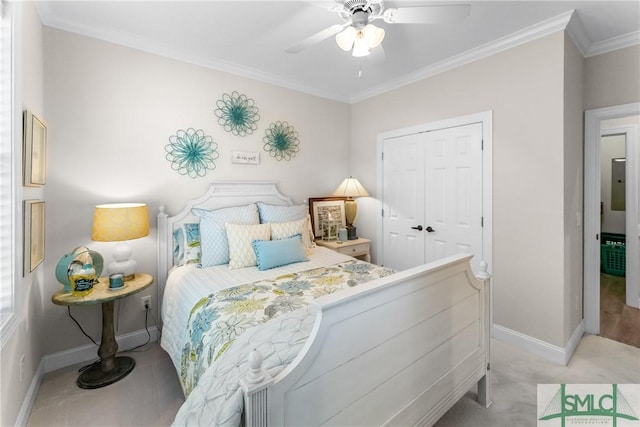 2203 River Oaks Dr, Richmond Hill, GA 31324 - bedroom featuring a closet, ornamental molding, a ceiling fan, and baseboards