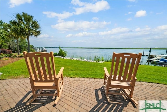 2203 River Oaks Dr, Richmond Hill, GA 31324 - view of patio with a water view