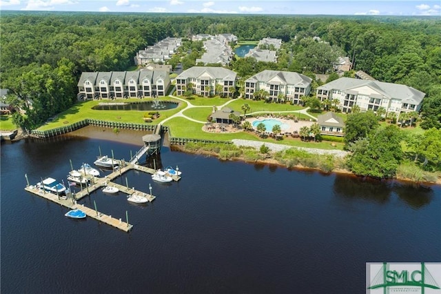 2203 River Oaks Dr, Richmond Hill, GA 31324 - aerial view featuring a wooded view and a water view