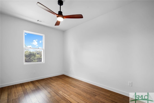 spare room with ceiling fan and hardwood / wood-style floors