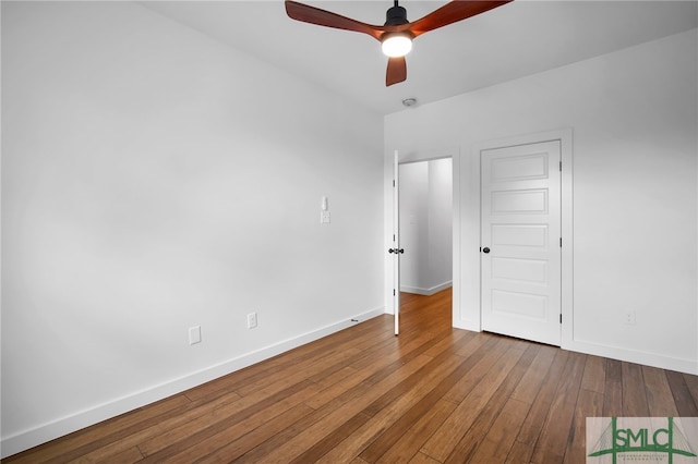 unfurnished bedroom with hardwood / wood-style flooring and ceiling fan