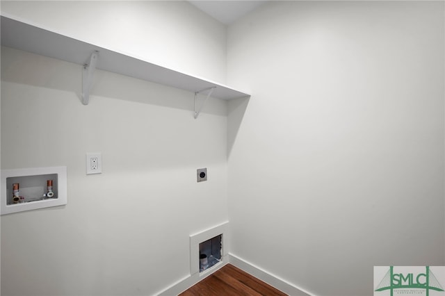 washroom with dark wood-type flooring, washer hookup, and electric dryer hookup