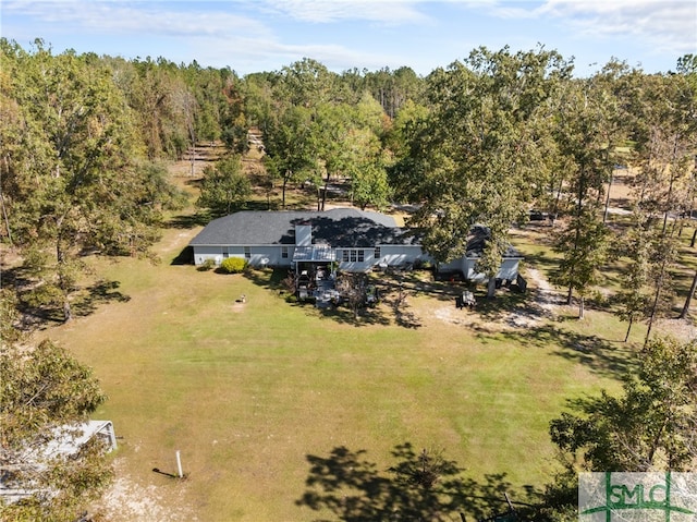 birds eye view of property with a rural view