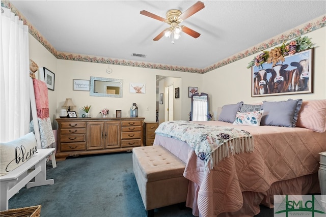 carpeted bedroom featuring ceiling fan