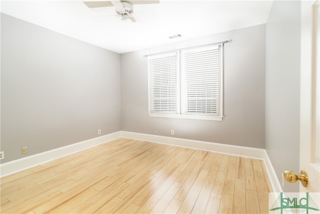 unfurnished room featuring hardwood / wood-style flooring and ceiling fan