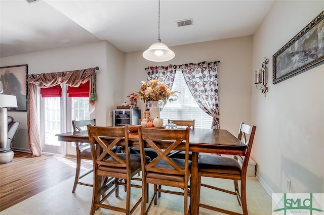 dining room featuring light hardwood / wood-style flooring