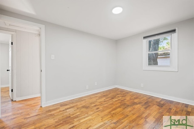 unfurnished room featuring light hardwood / wood-style floors