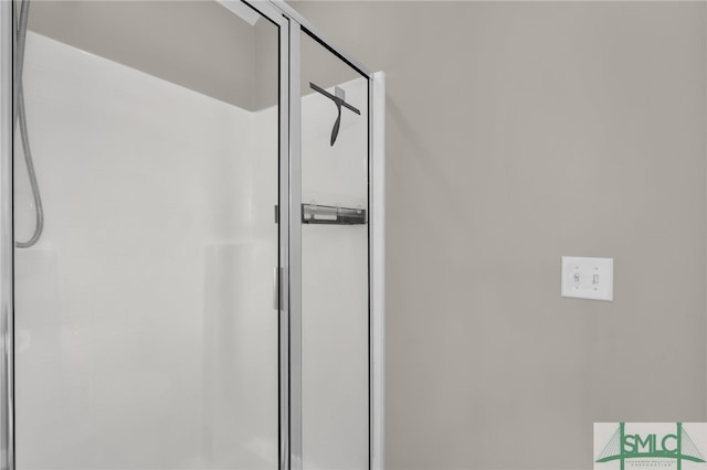 bathroom with an enclosed shower