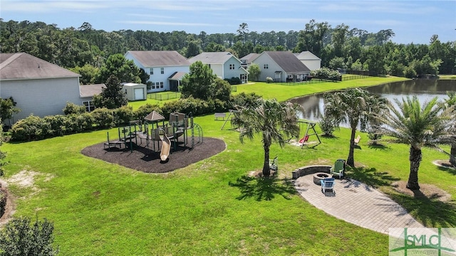 drone / aerial view with a water view