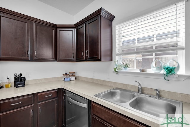 kitchen featuring dark brown cabinets, stainless steel dishwasher, and sink