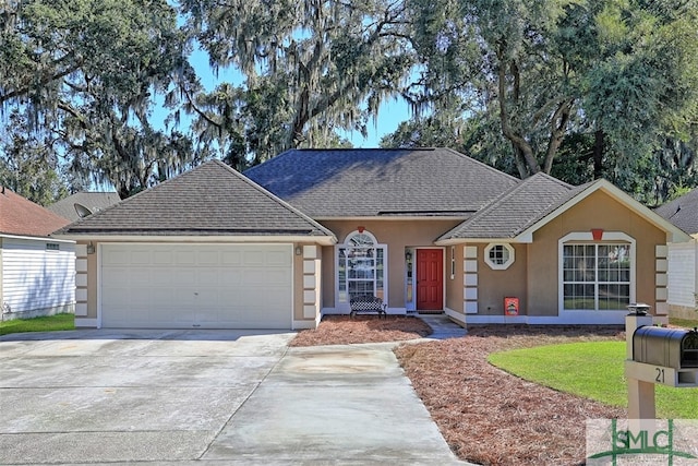 ranch-style house featuring a garage