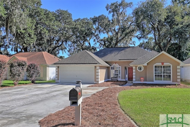 ranch-style house with a garage and a front yard