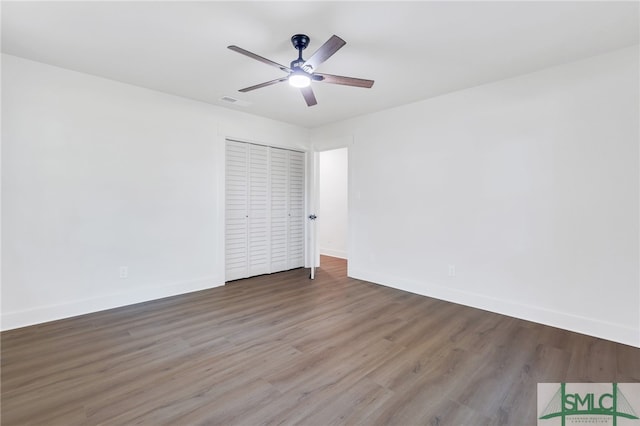 unfurnished room featuring wood-type flooring and ceiling fan