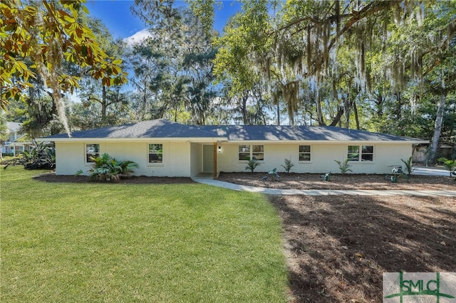 view of front of home with a front yard