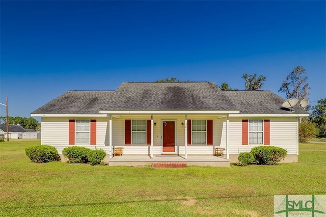 single story home with a front lawn and covered porch