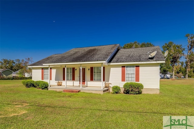 view of front facade featuring a front yard and a porch