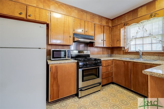 kitchen featuring stainless steel appliances and sink