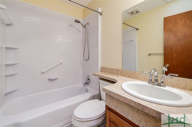 full bathroom with toilet, tiled shower / bath combo, and vanity