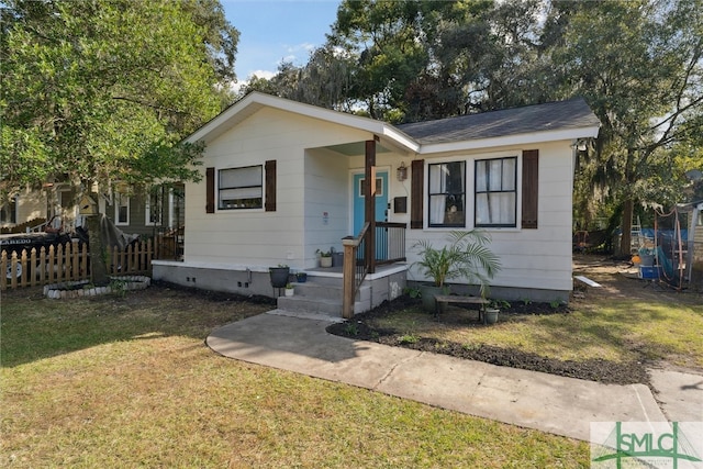 view of front of home with a front lawn