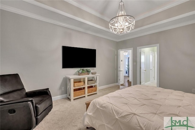 bedroom with carpet, baseboards, a raised ceiling, and a notable chandelier