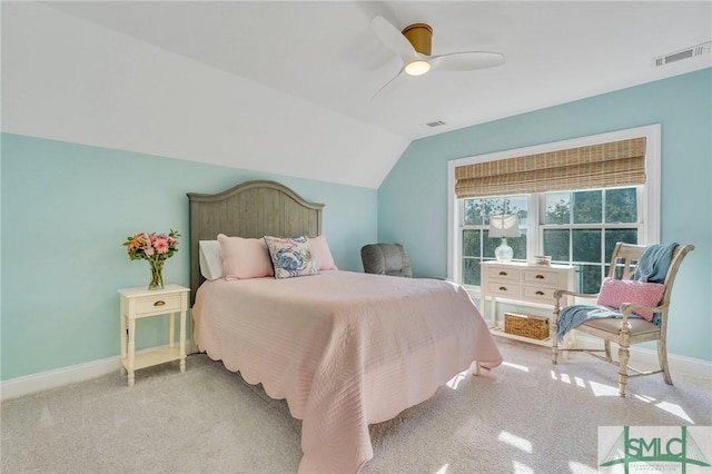 bedroom with carpet, visible vents, lofted ceiling, and baseboards