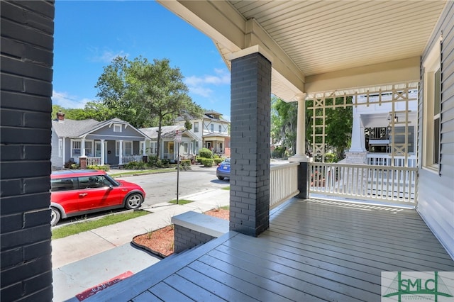 wooden deck featuring a porch