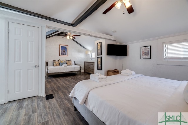 bedroom with lofted ceiling with beams, ceiling fan, and dark wood-type flooring