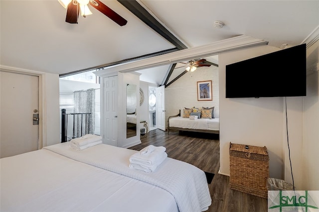 bedroom with lofted ceiling with beams, ceiling fan, and dark wood-type flooring