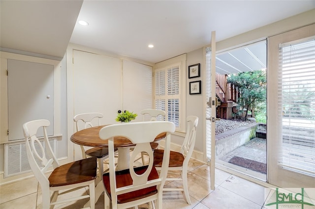 dining room featuring light tile patterned floors