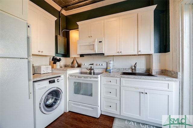 kitchen with washer / clothes dryer, sink, white cabinets, and white appliances