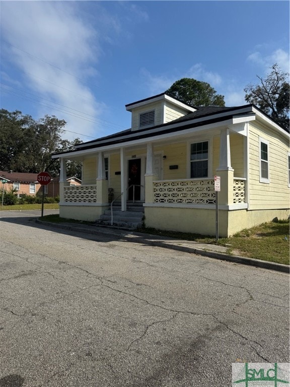 bungalow-style house featuring a porch