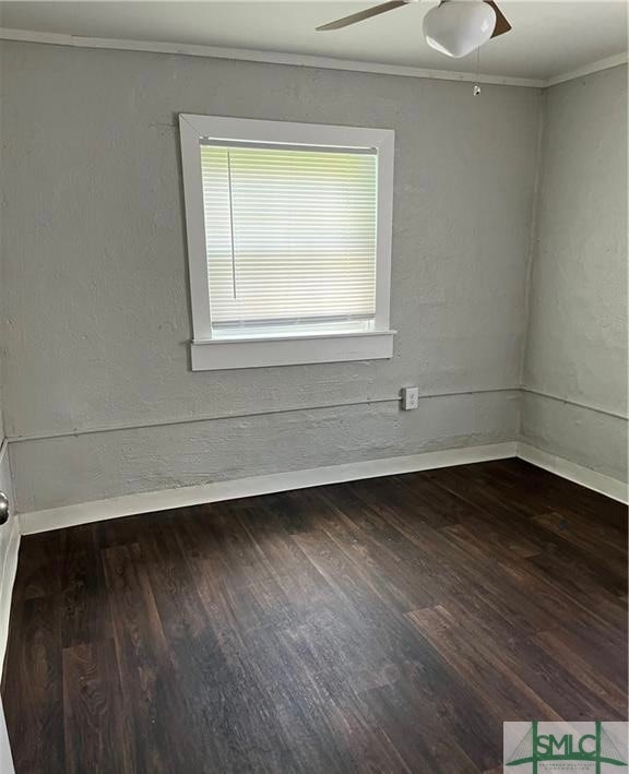 unfurnished room with ornamental molding, wood-type flooring, and ceiling fan