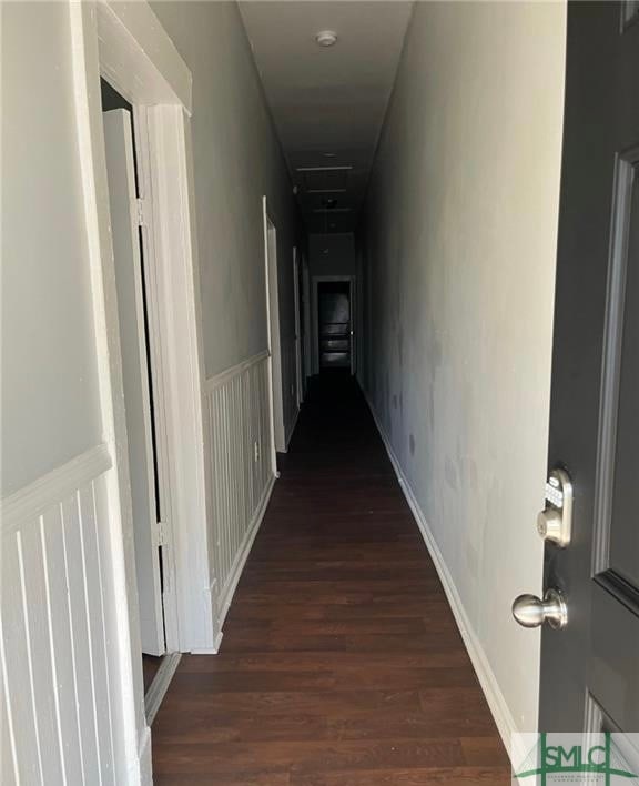 hall featuring dark wood-type flooring