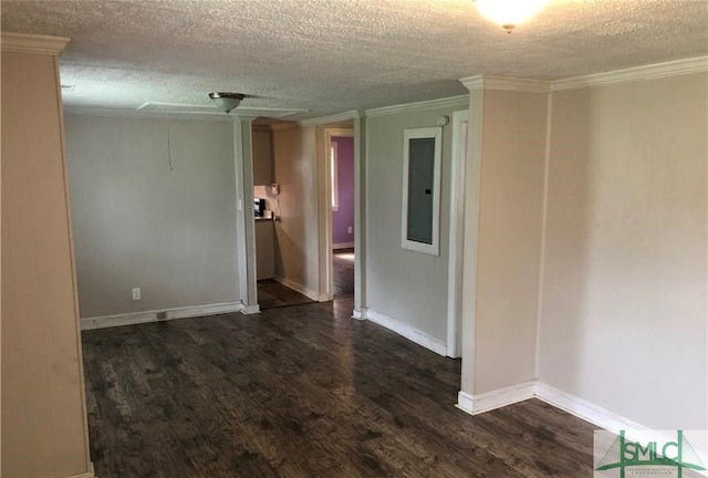 unfurnished room featuring crown molding, a textured ceiling, electric panel, and dark hardwood / wood-style floors