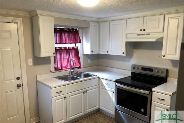 kitchen featuring white cabinetry, a textured ceiling, sink, and stainless steel range with electric cooktop