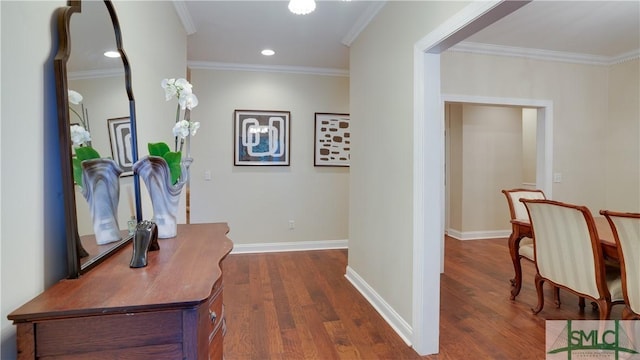 hall featuring dark hardwood / wood-style flooring and ornamental molding