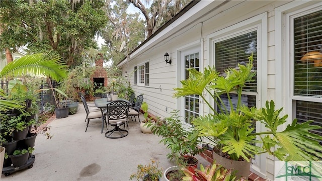 view of patio / terrace with a fireplace