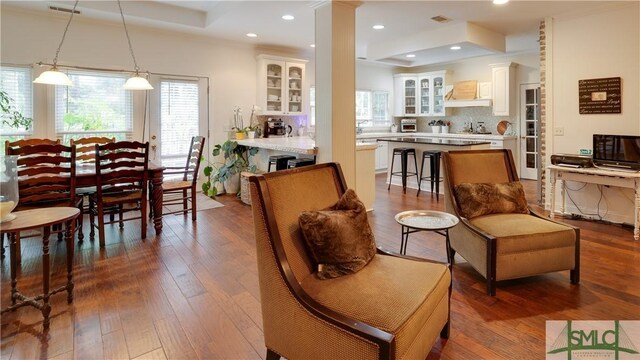 living room with hardwood / wood-style flooring and plenty of natural light