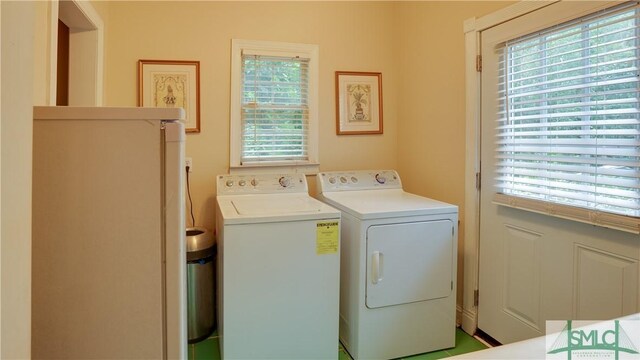 laundry room featuring washer and dryer