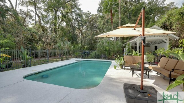 view of swimming pool featuring an outdoor hangout area and a patio