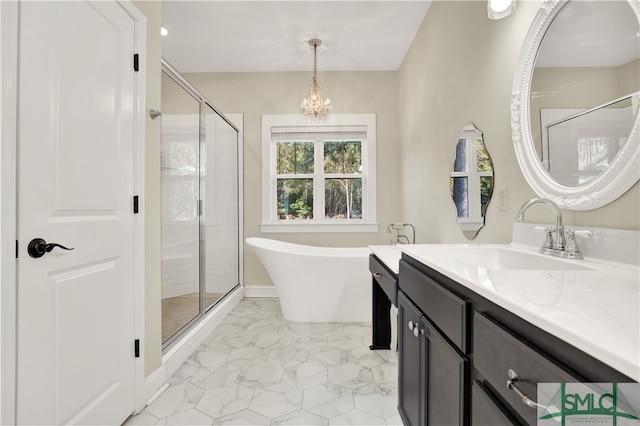 bathroom featuring vanity, a chandelier, and plus walk in shower