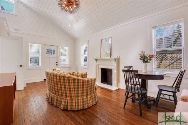 living room featuring wood ceiling, high vaulted ceiling, a wealth of natural light, and hardwood / wood-style floors