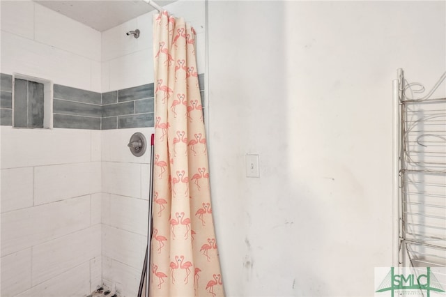 bathroom featuring curtained shower