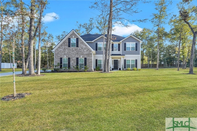 view of front of home with a front yard