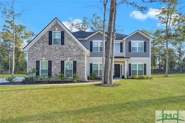 view of front facade featuring a front yard