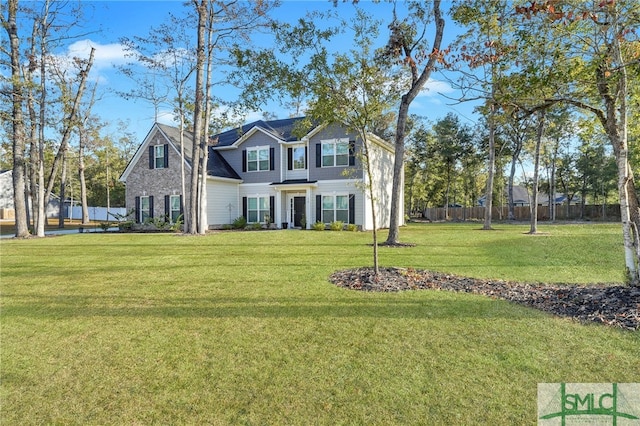 view of front of house with a front lawn